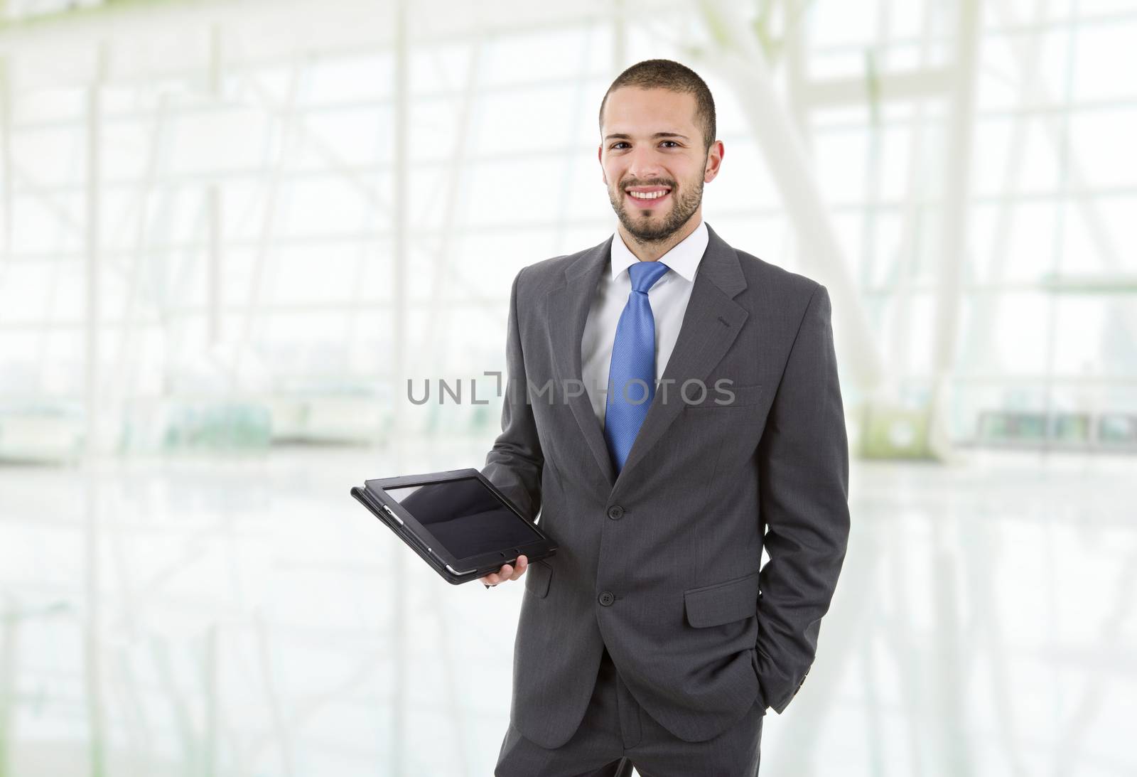 businessman using touch pad of tablet pc, at the office