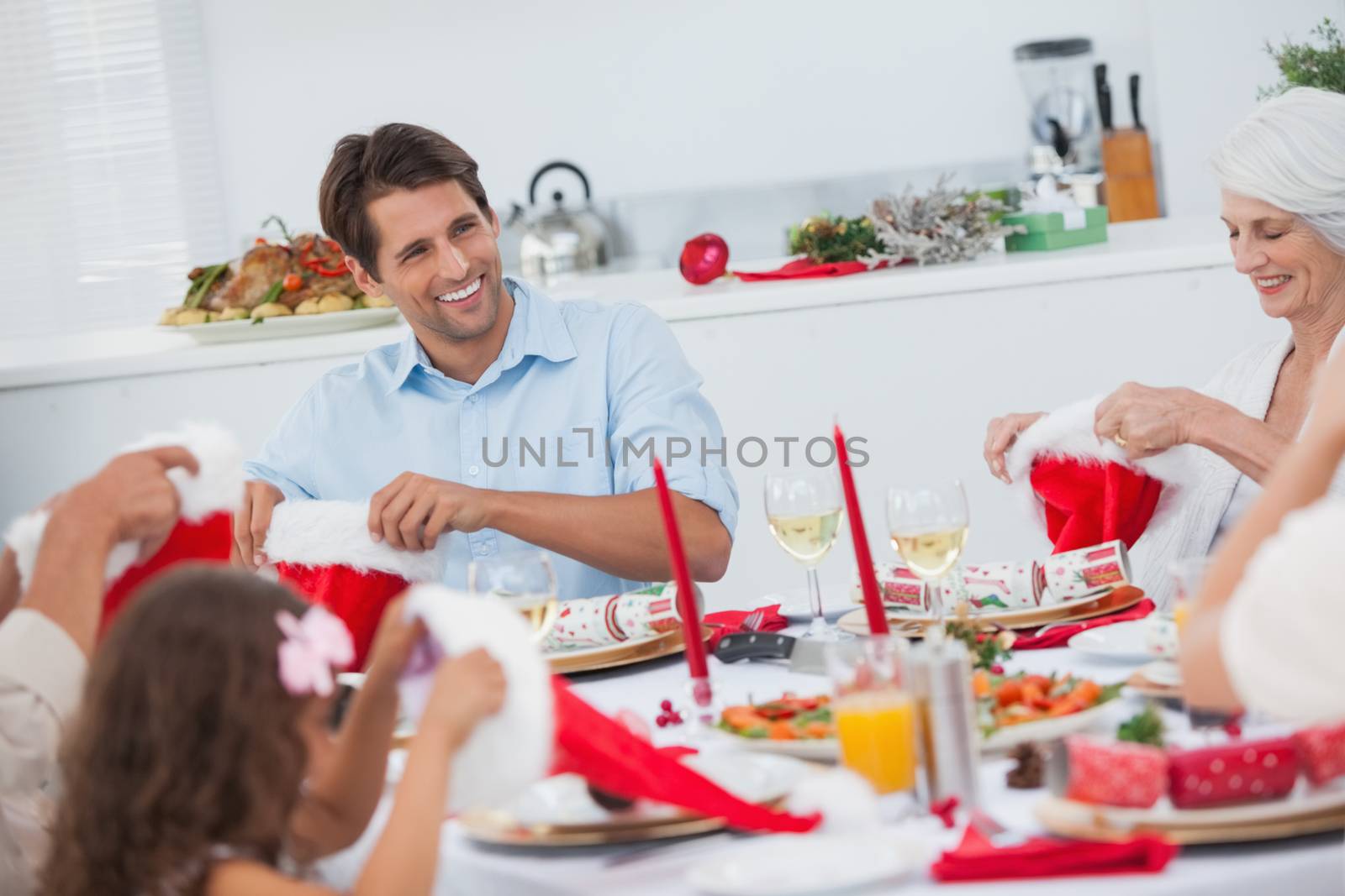 Cheerful family dining together for christmas