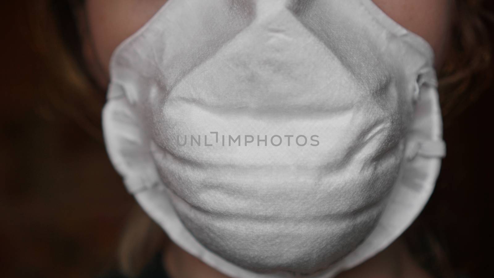 Respirator or medical face mask. Close-up by natali_brill