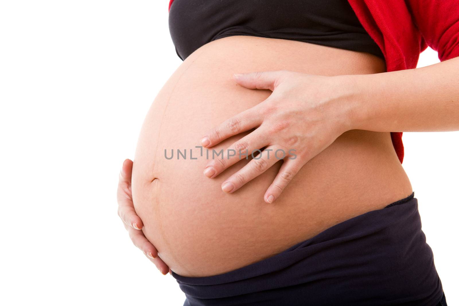 Closeup of pregnant woman at white background