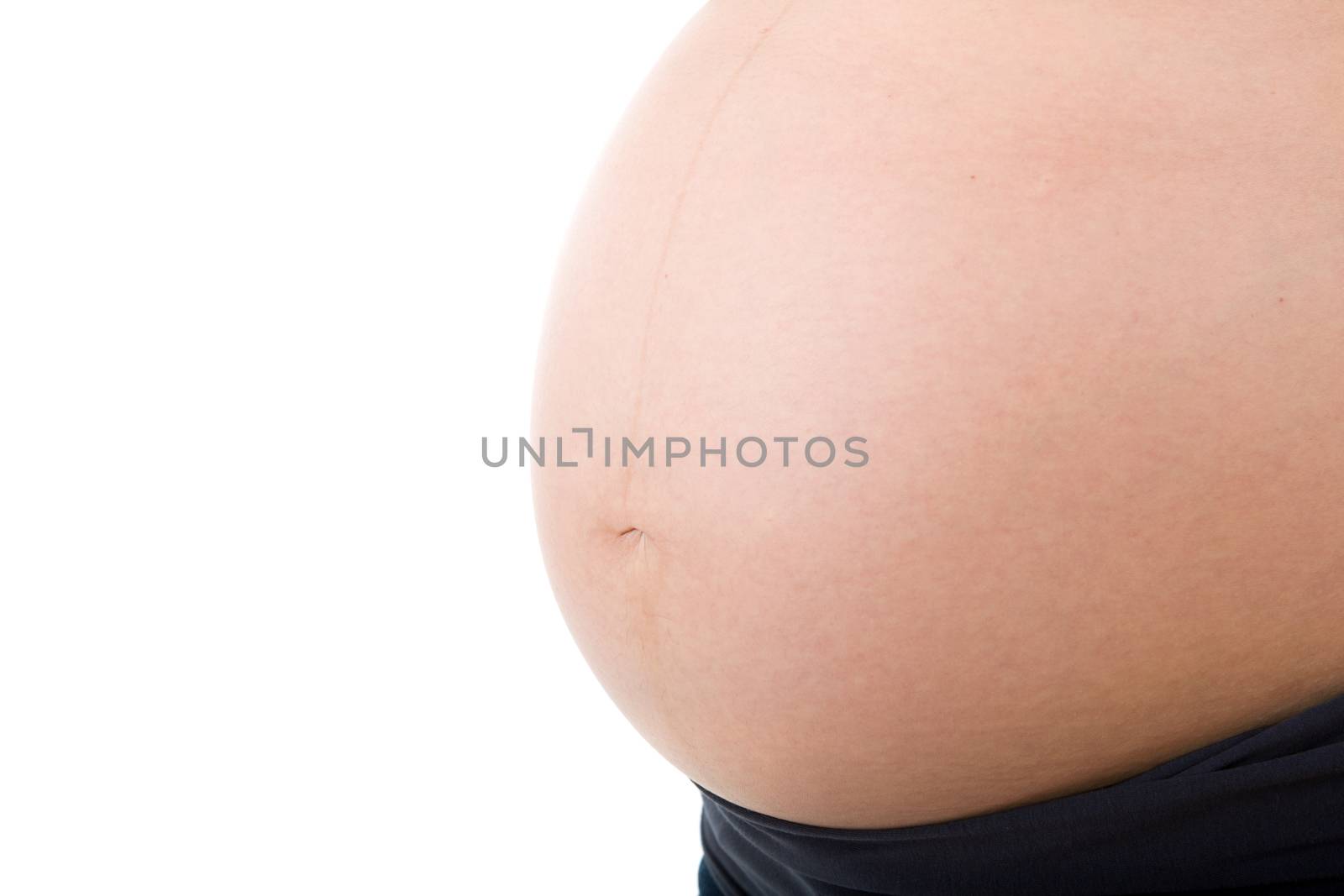 Closeup of pregnant woman at white background