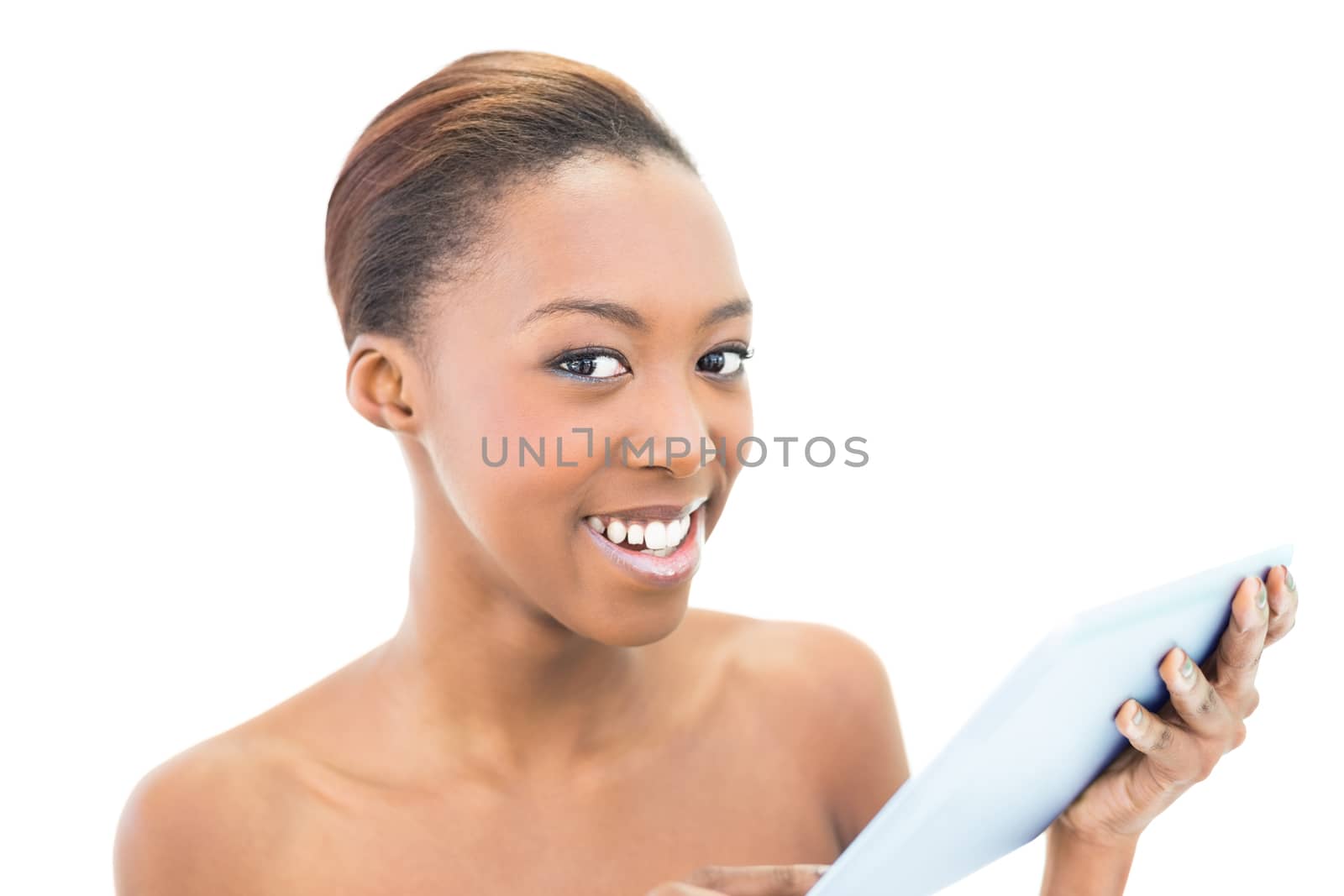 Cheerful natural beauty holding tablet computer on white background