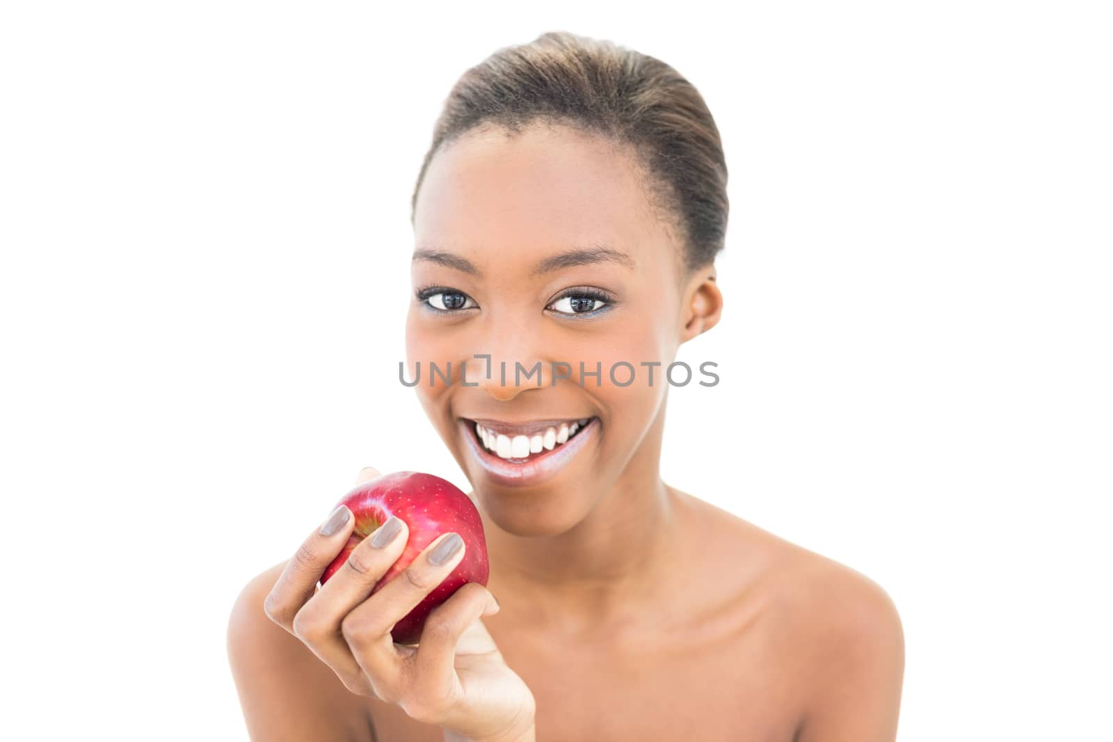 Smiling natural beauty holding red apple on white background