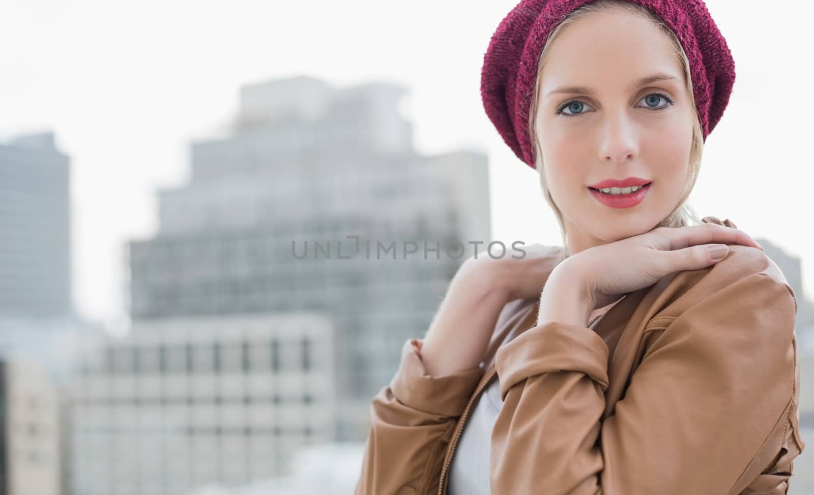 Gorgeous casual blonde posing outdoors by Wavebreakmedia