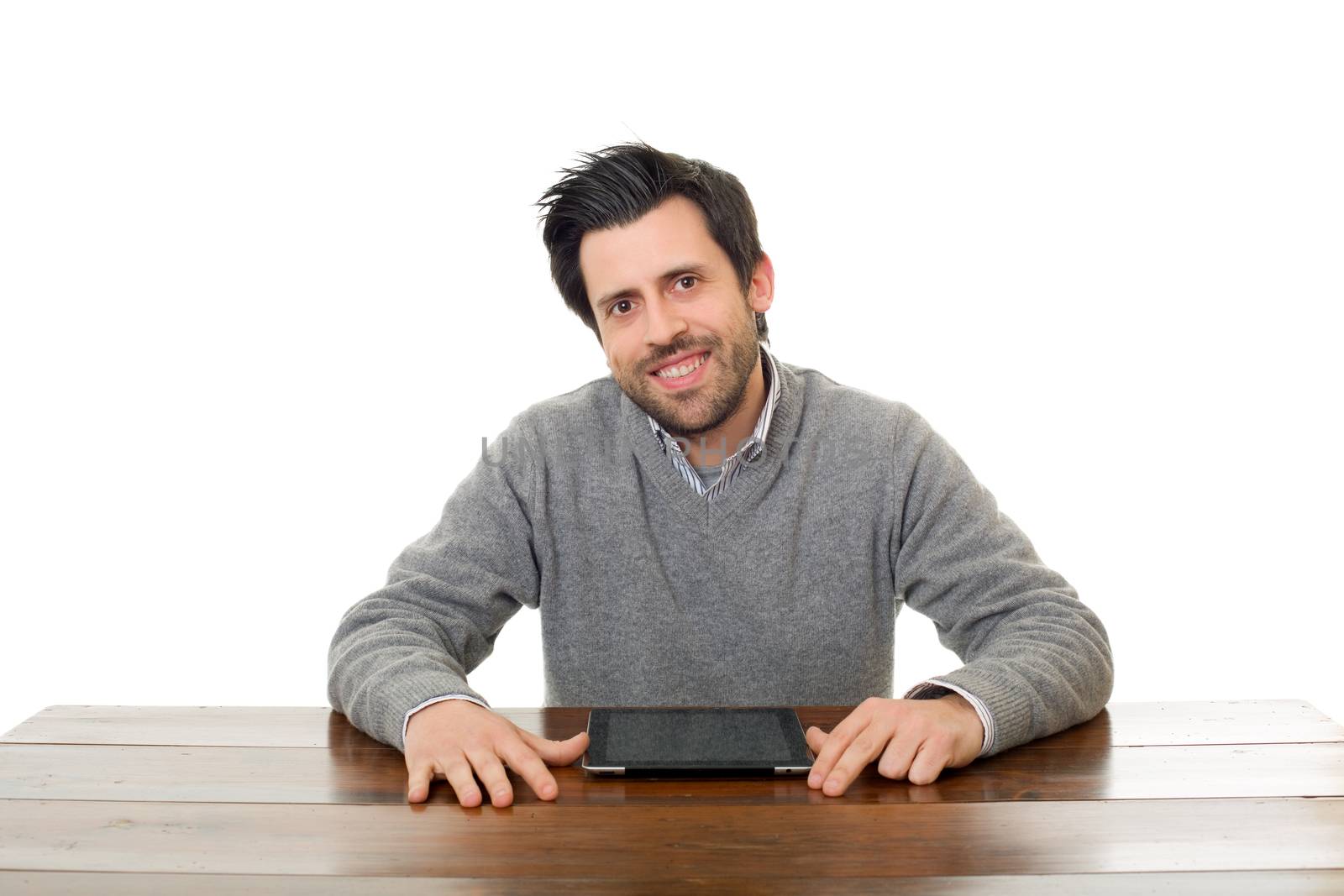 happy man on a desk with a tablet pc, isolated