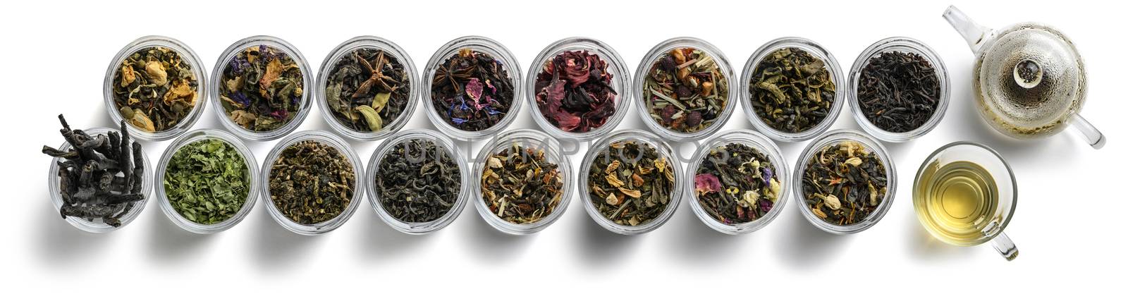 Large assortment of tea on a white background. The view from the top.