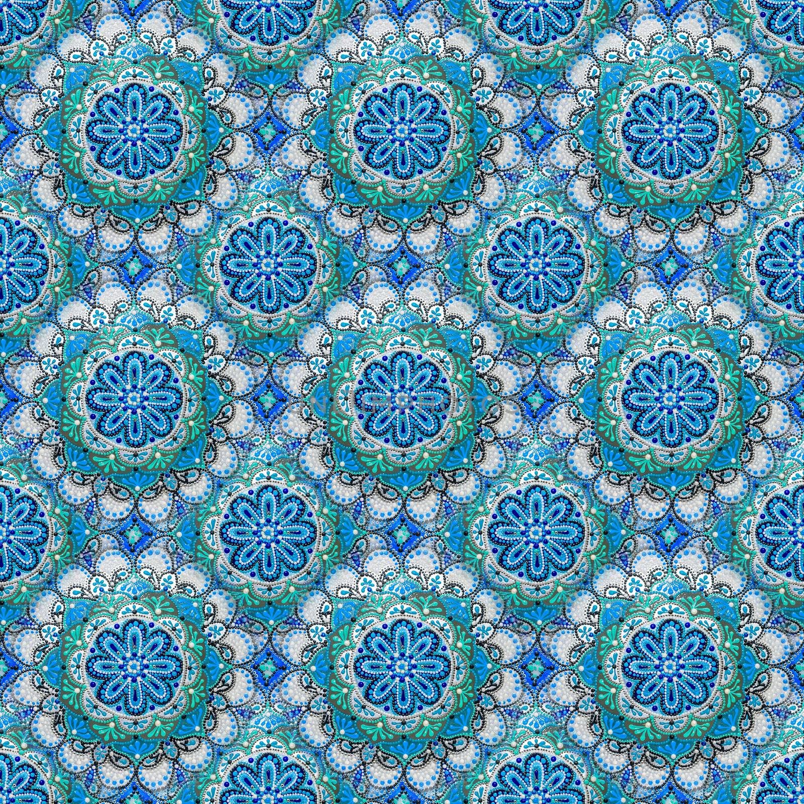 Seamless background from a set of decorative ceramic dishes hand-painted with acrylic paints with a floral pattern.