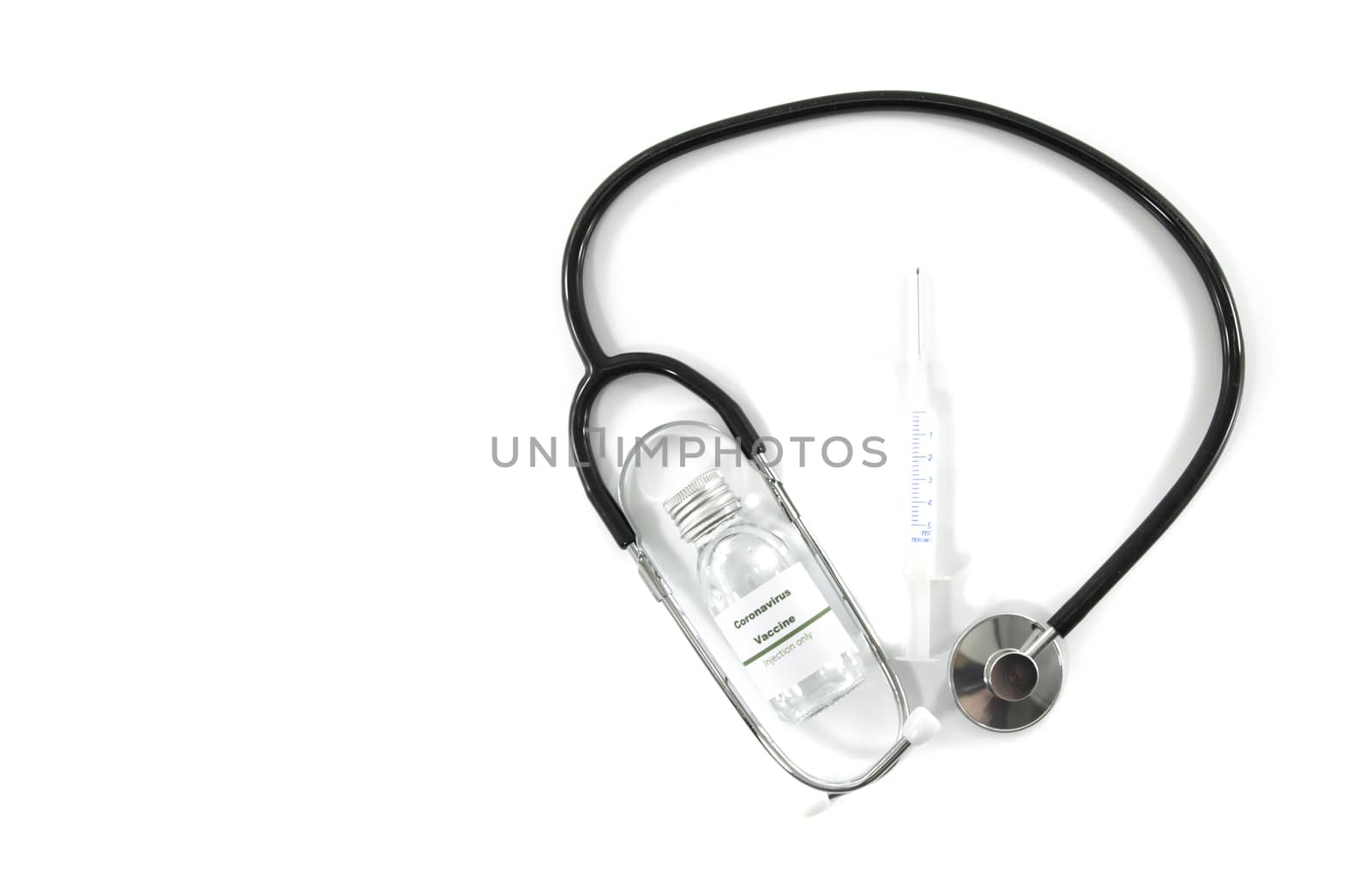 Coronavirus vaccine vial with injection syringe isolated and stethoscope on white background