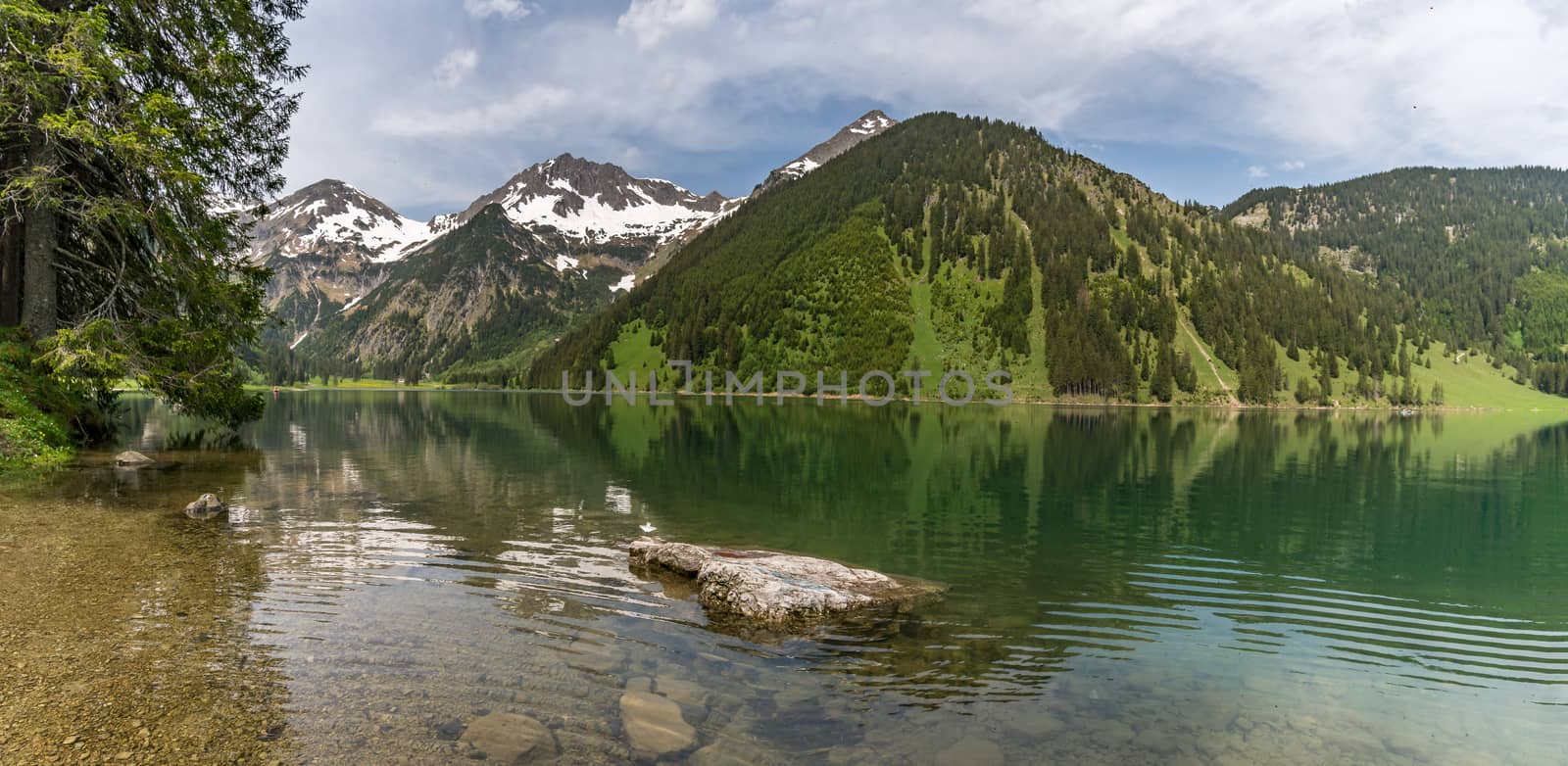 Adventurous hike around Vilsalpsee to the great Bergaicht waterfall in the Tannheimer Tal