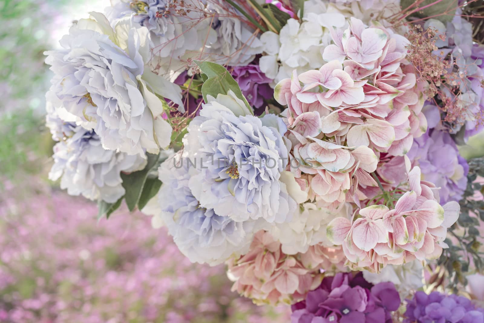 colorful of the plastic flowers bouquet , soft of focus