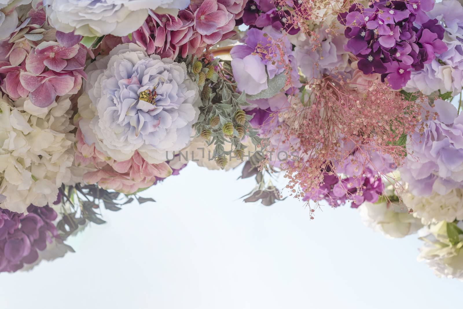 colorful of the plastic flowers bouquet , soft of focus