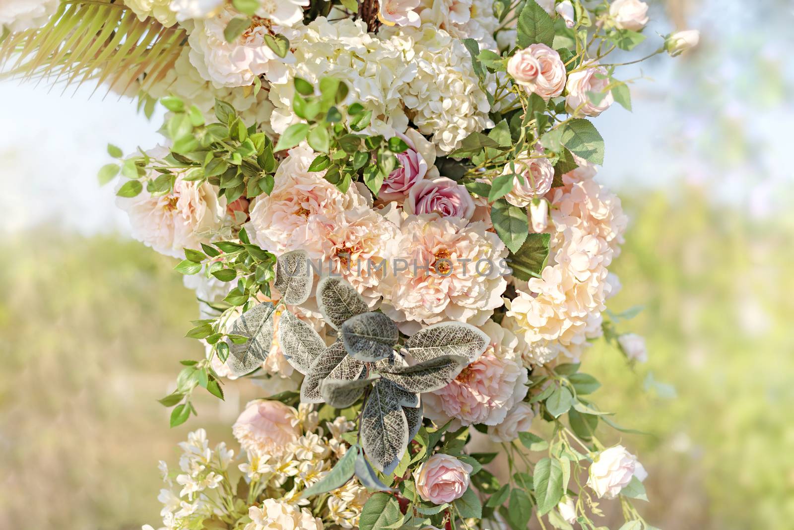 colorful of the plastic flowers bouquet , soft of focus