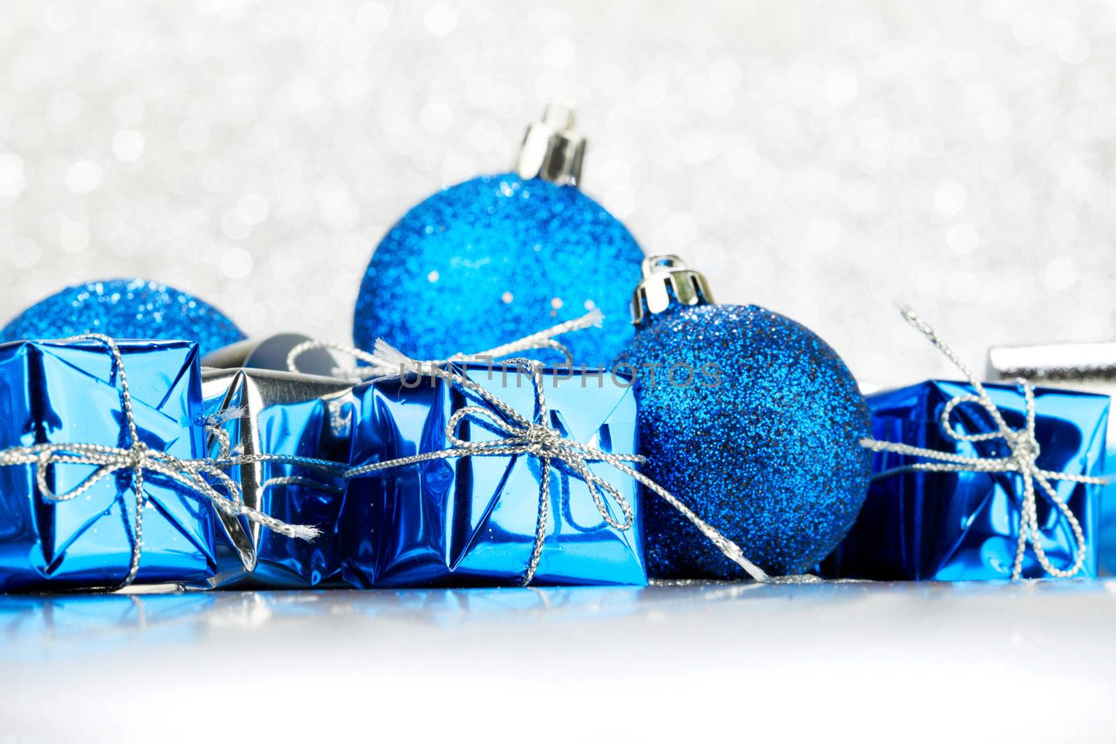 Christmas card with gifts and decorative balls close-up