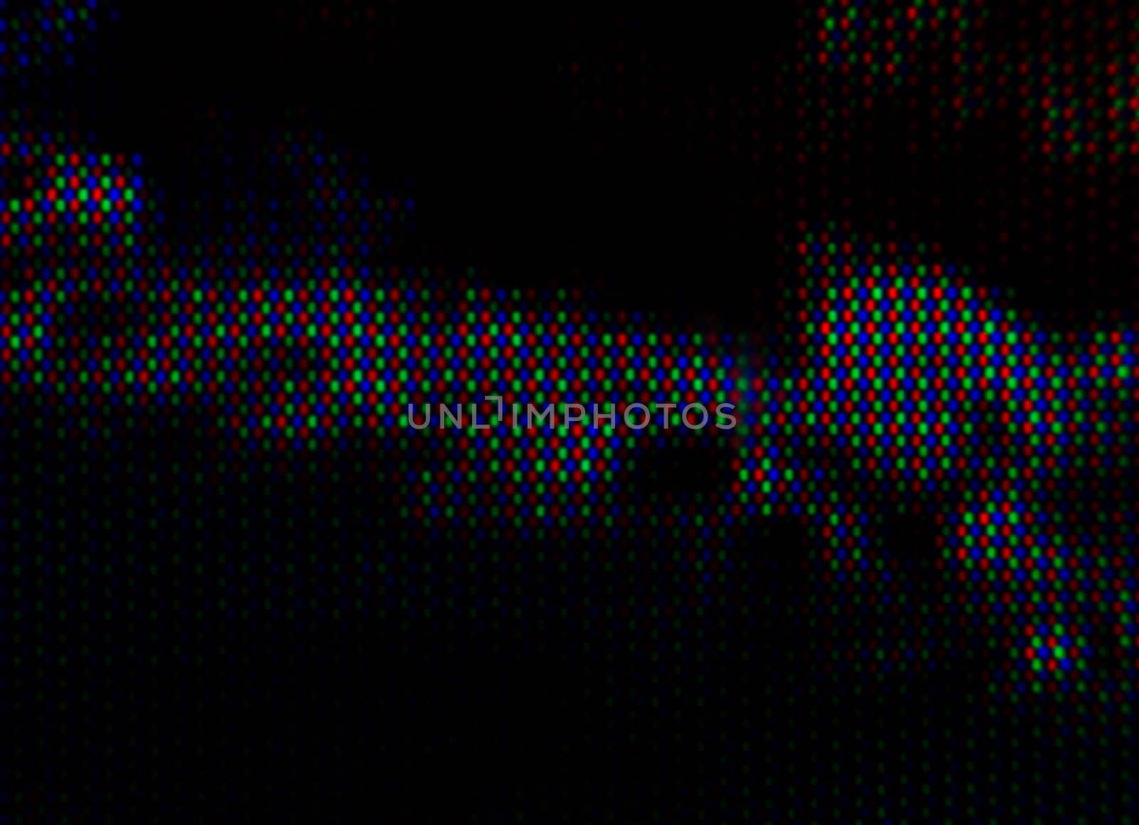 abstract background pattern of colored blurry dots on a dark background close up