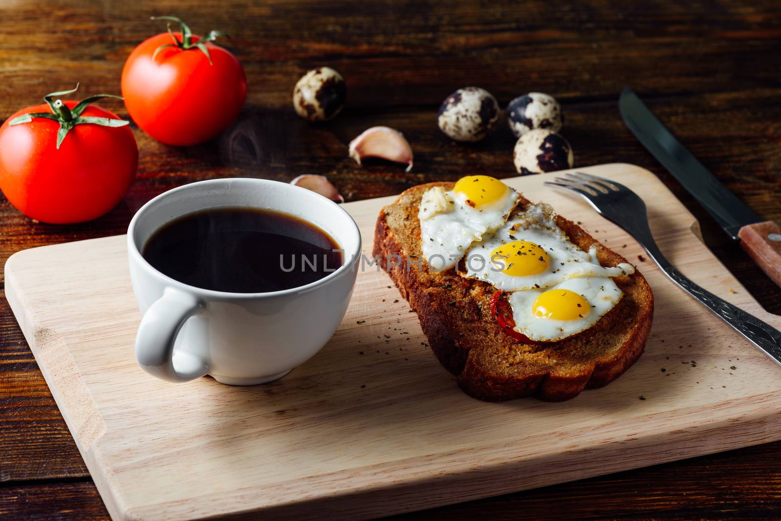 Cup of Coffee and Bruschetta with Fried Eggs by Seva_blsv