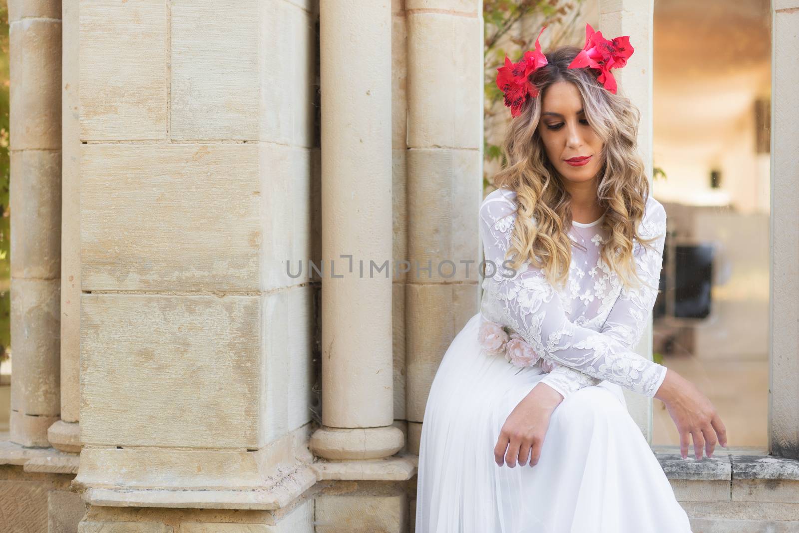 Portrait of beautiful blond girl in medieval dress with red diadem. Fairy tale scene by HERRAEZ