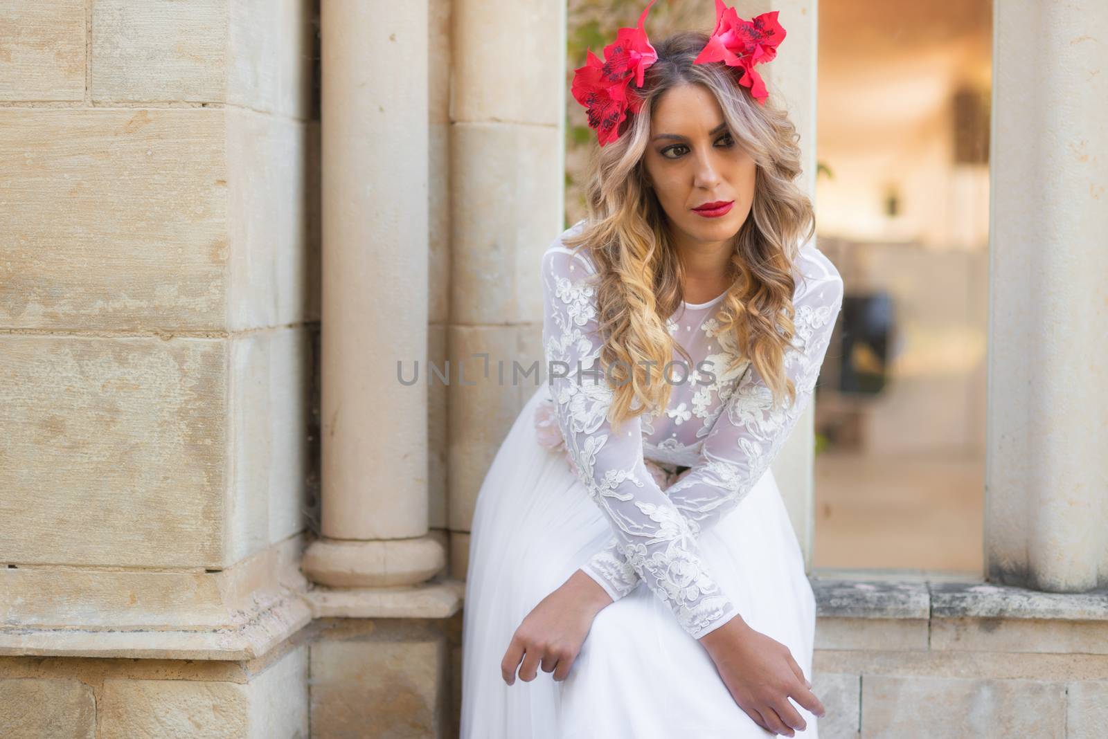 Portrait of beautiful blond girl in medieval dress with red diadem. Fairy tale scene by HERRAEZ