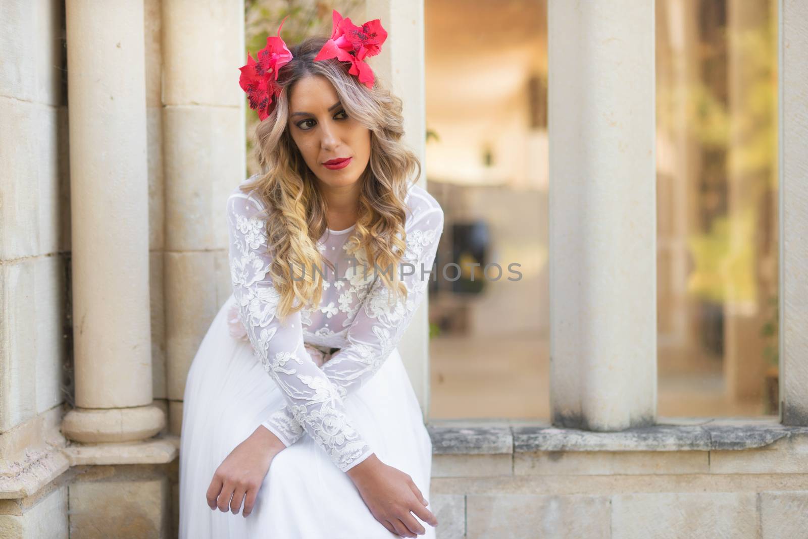 Portrait of beautiful blond girl in medieval dress with red diadem. Fairy tale scene by HERRAEZ