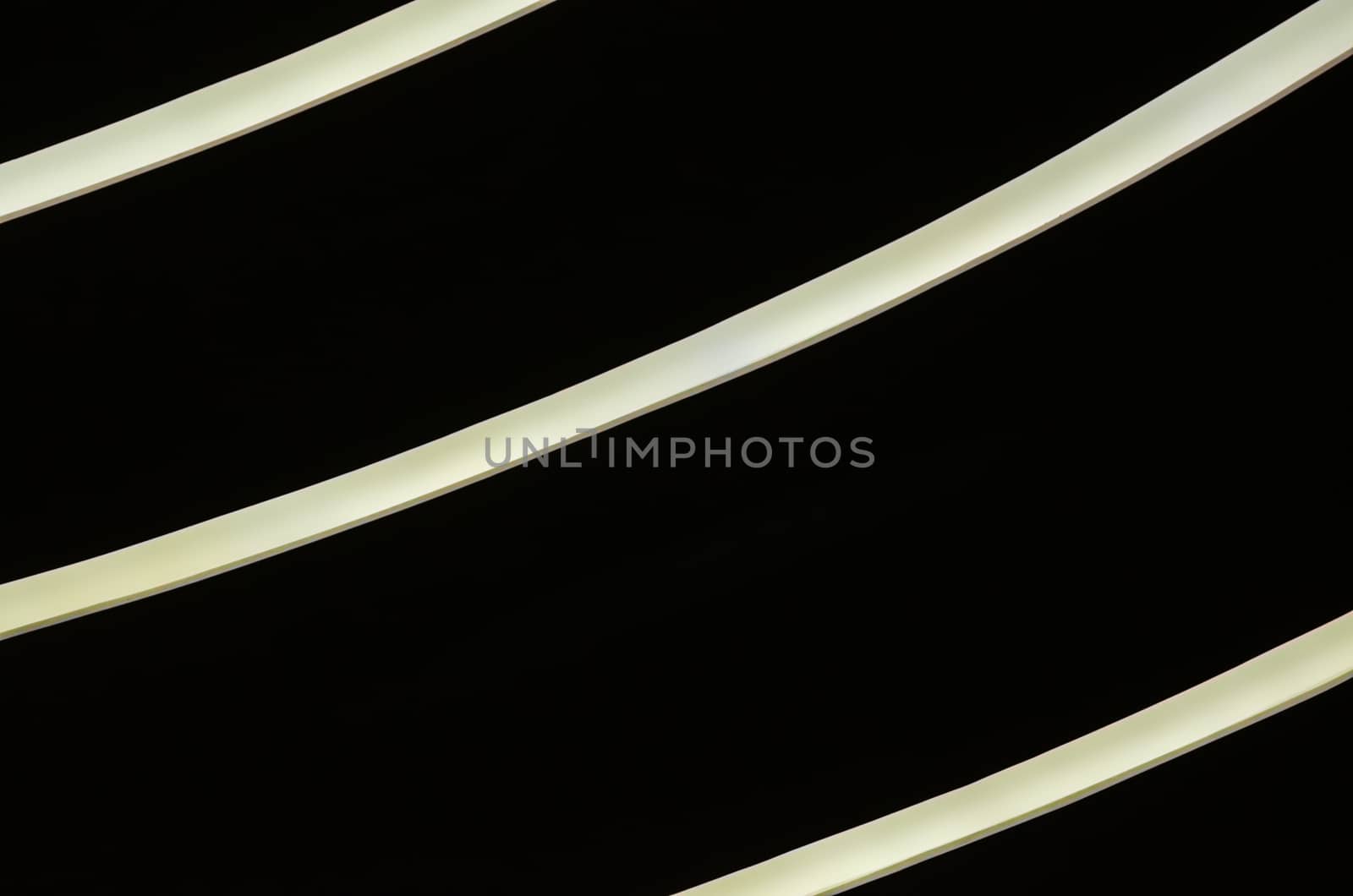 part of a modern building with lighting abstract background yellow curved lines