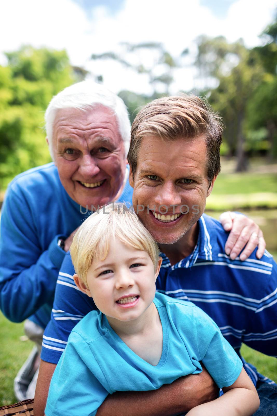 Portrait of multi-generation family smiling by Wavebreakmedia