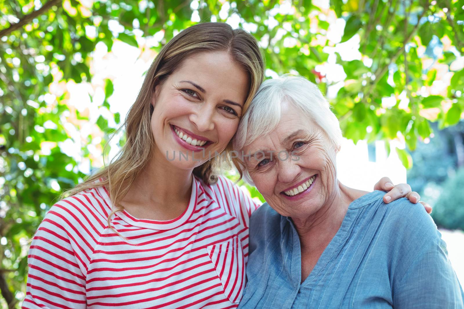 Portrait of happy mother and daughter  by Wavebreakmedia