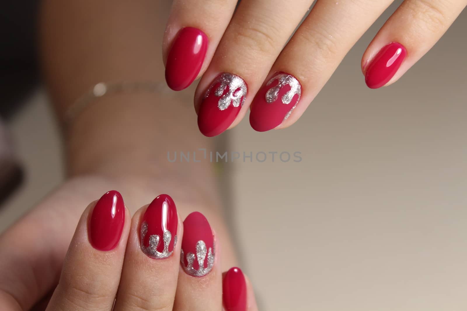 Youth manicure design, color red and silver