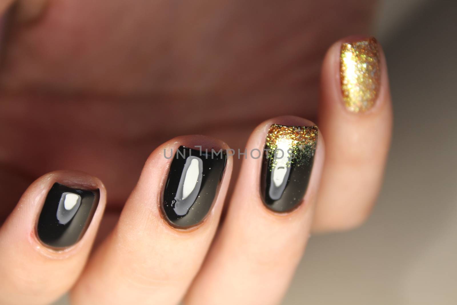 manicure design black and gold color by SmirMaxStock