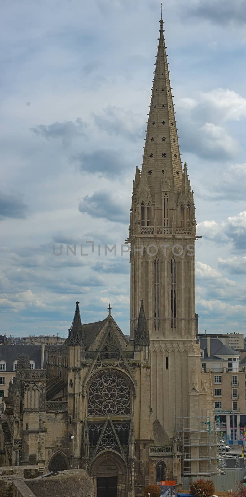 View from fortress on tall Catholic cathedral in Caen, France