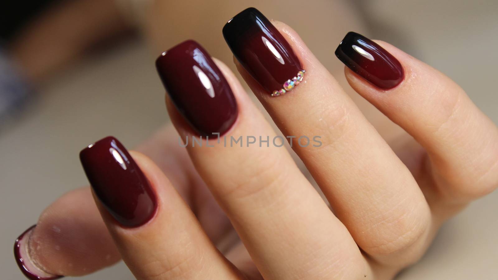 Manicure design gradient burgundy with black color