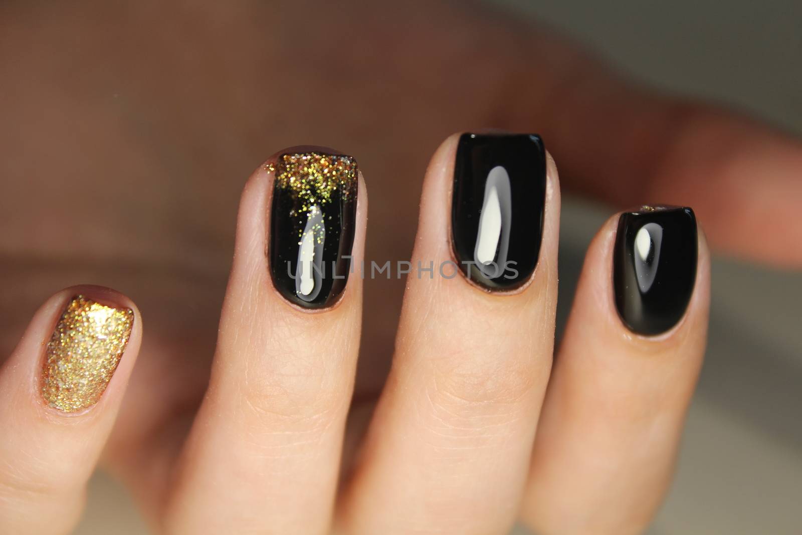 manicure design black and gold color by SmirMaxStock