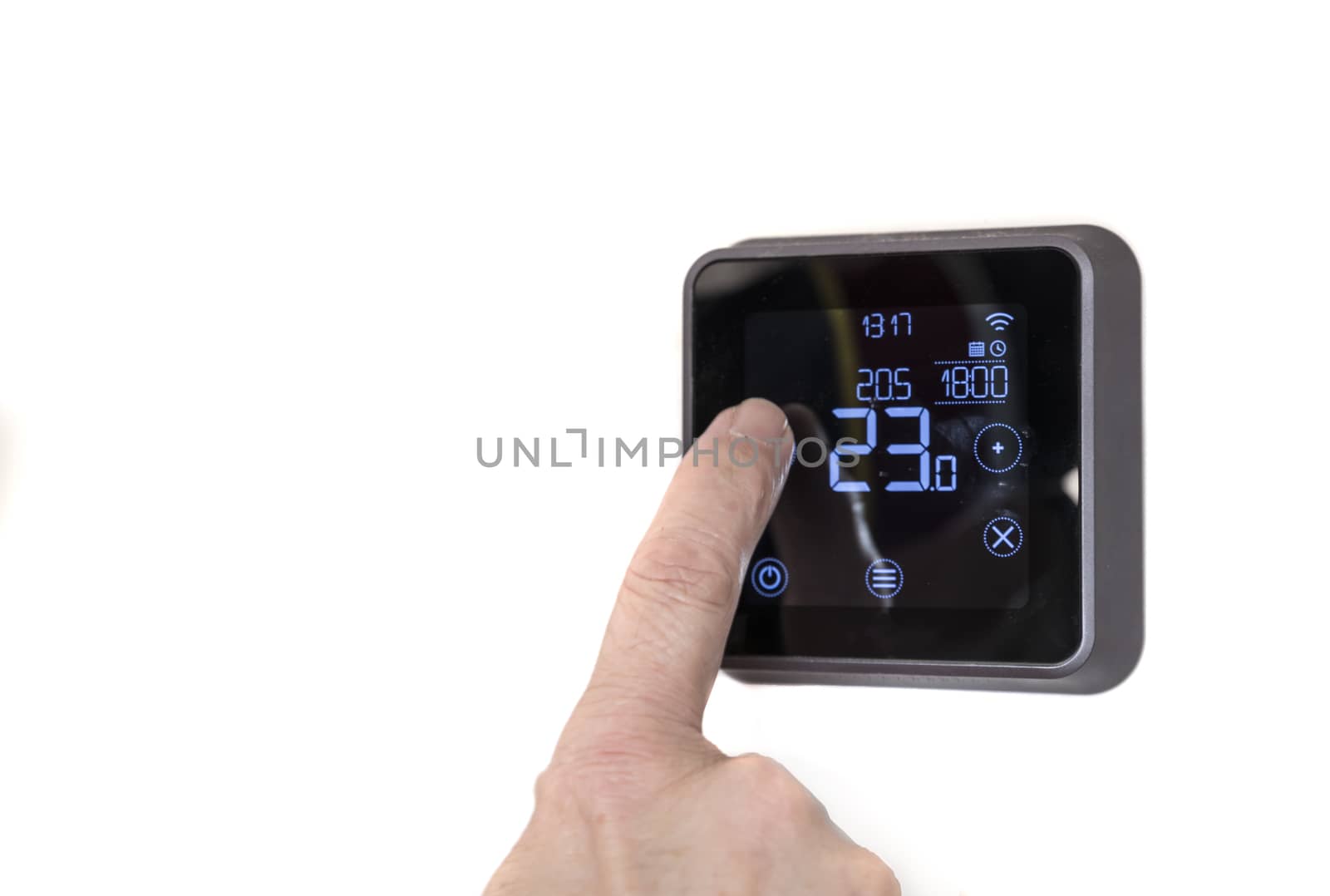 man lower the programmable digital  thermostat