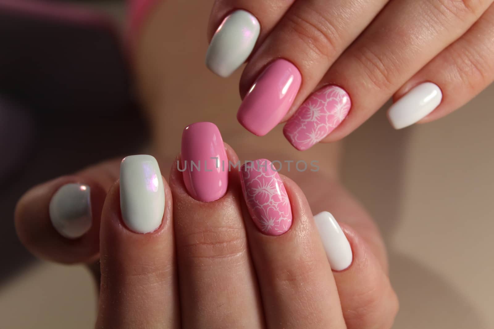 design of manicure Pink and white color by SmirMaxStock