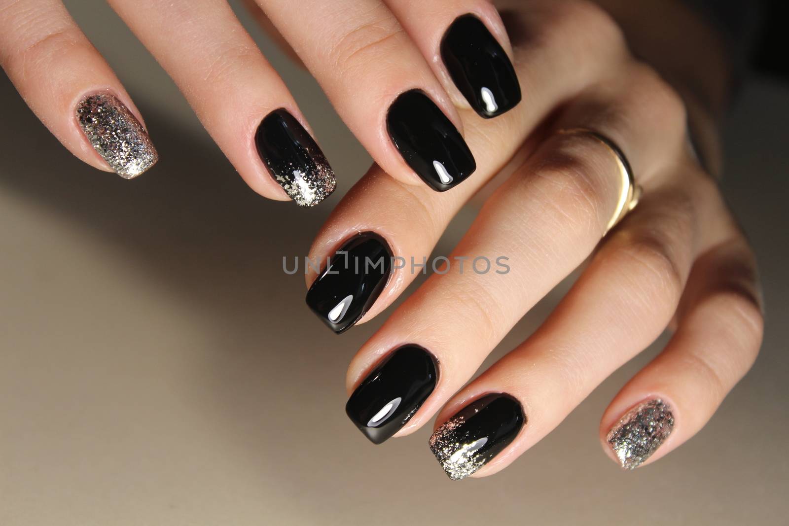 fashion black and gold color manicure design by SmirMaxStock