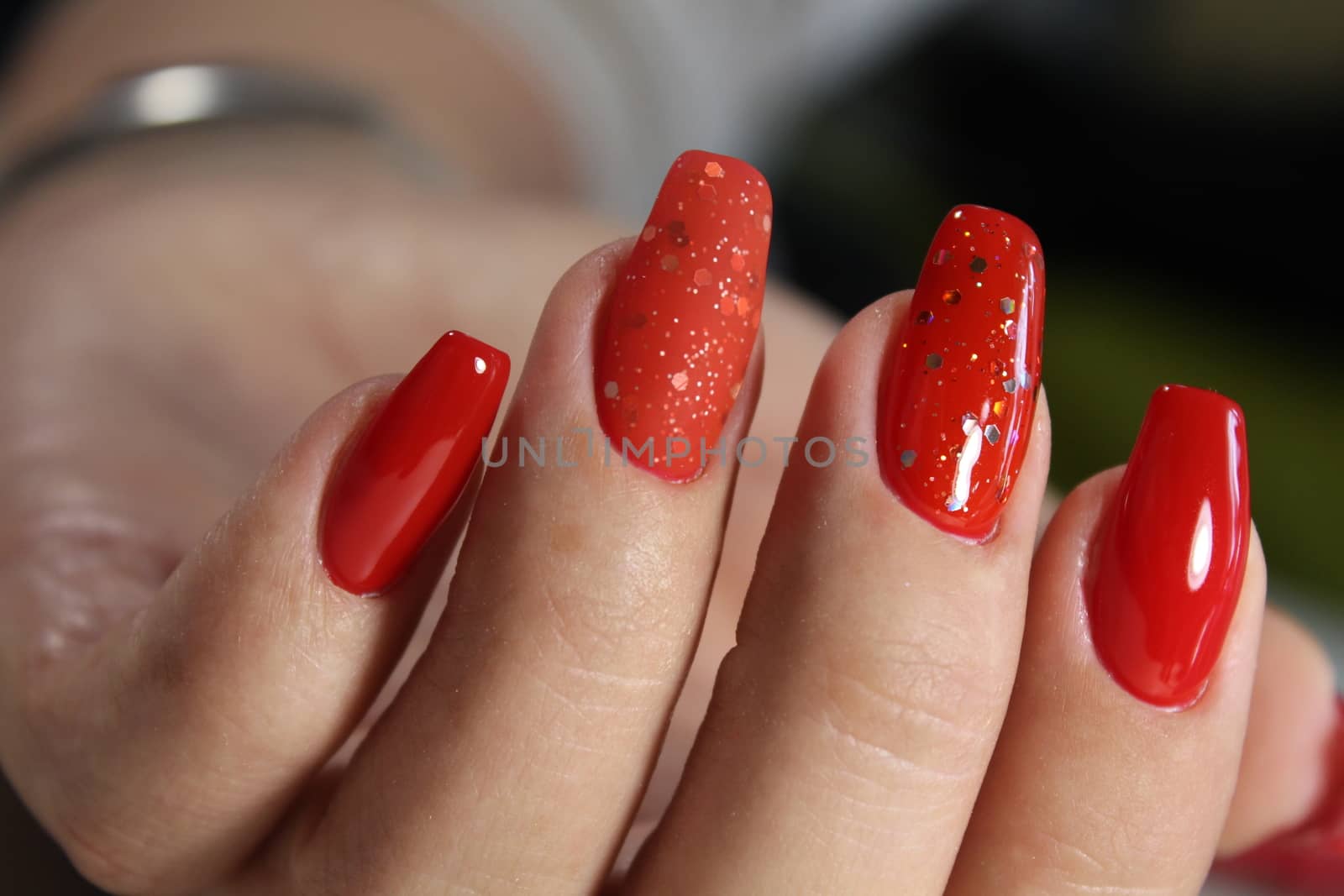 Youth manicure design red color by SmirMaxStock