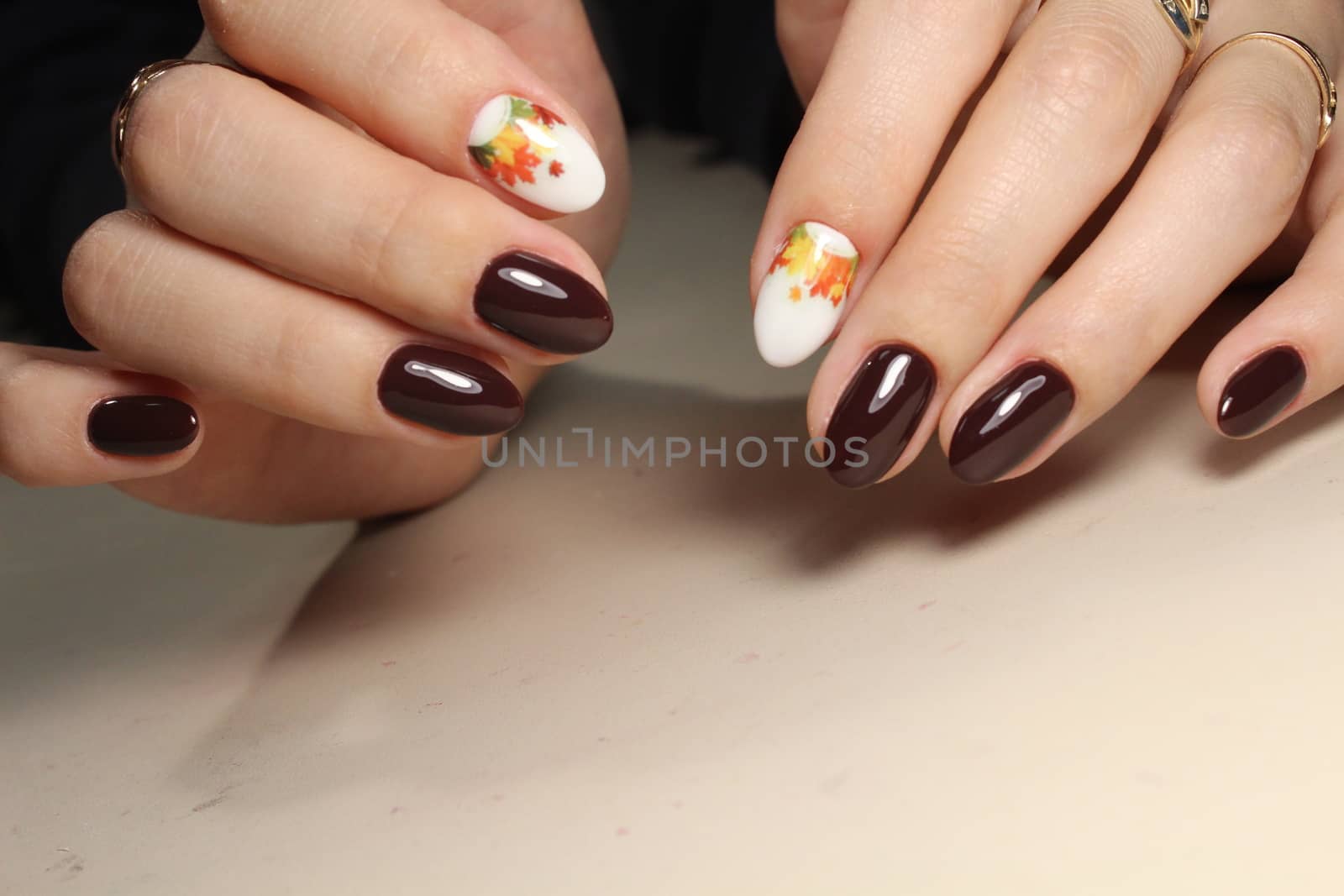 brown manicure with coffee beans by SmirMaxStock