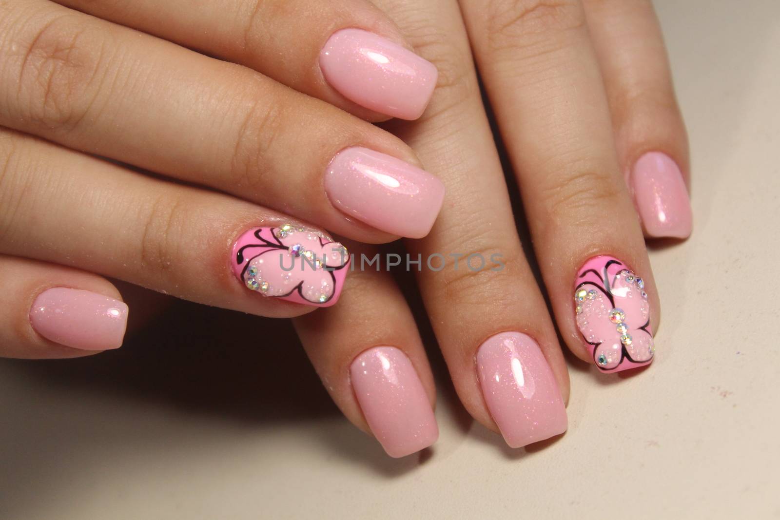 Manicure nail design with a butterfly pattern by SmirMaxStock