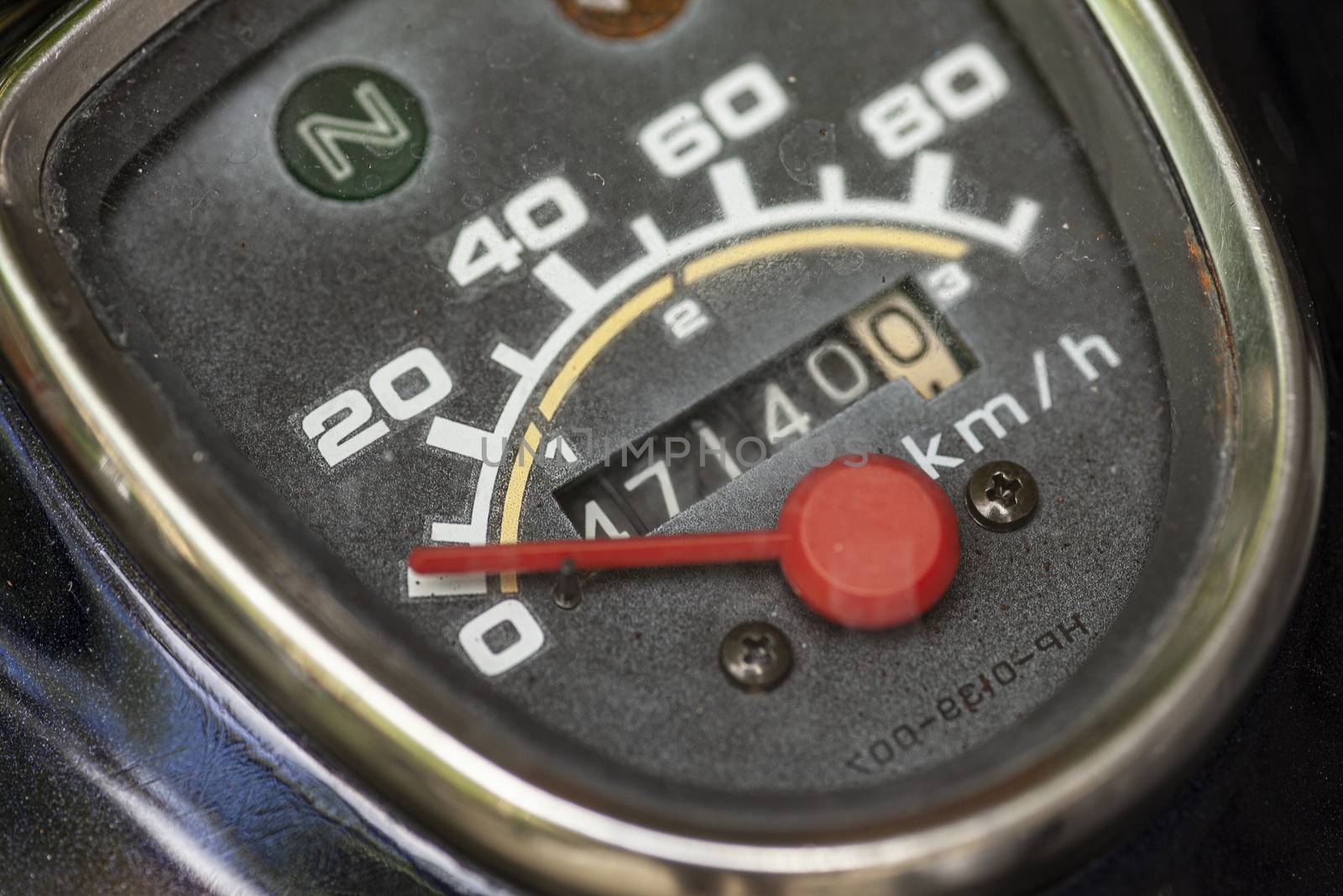 Odometer of a vintage motorcycle in a macro shoot