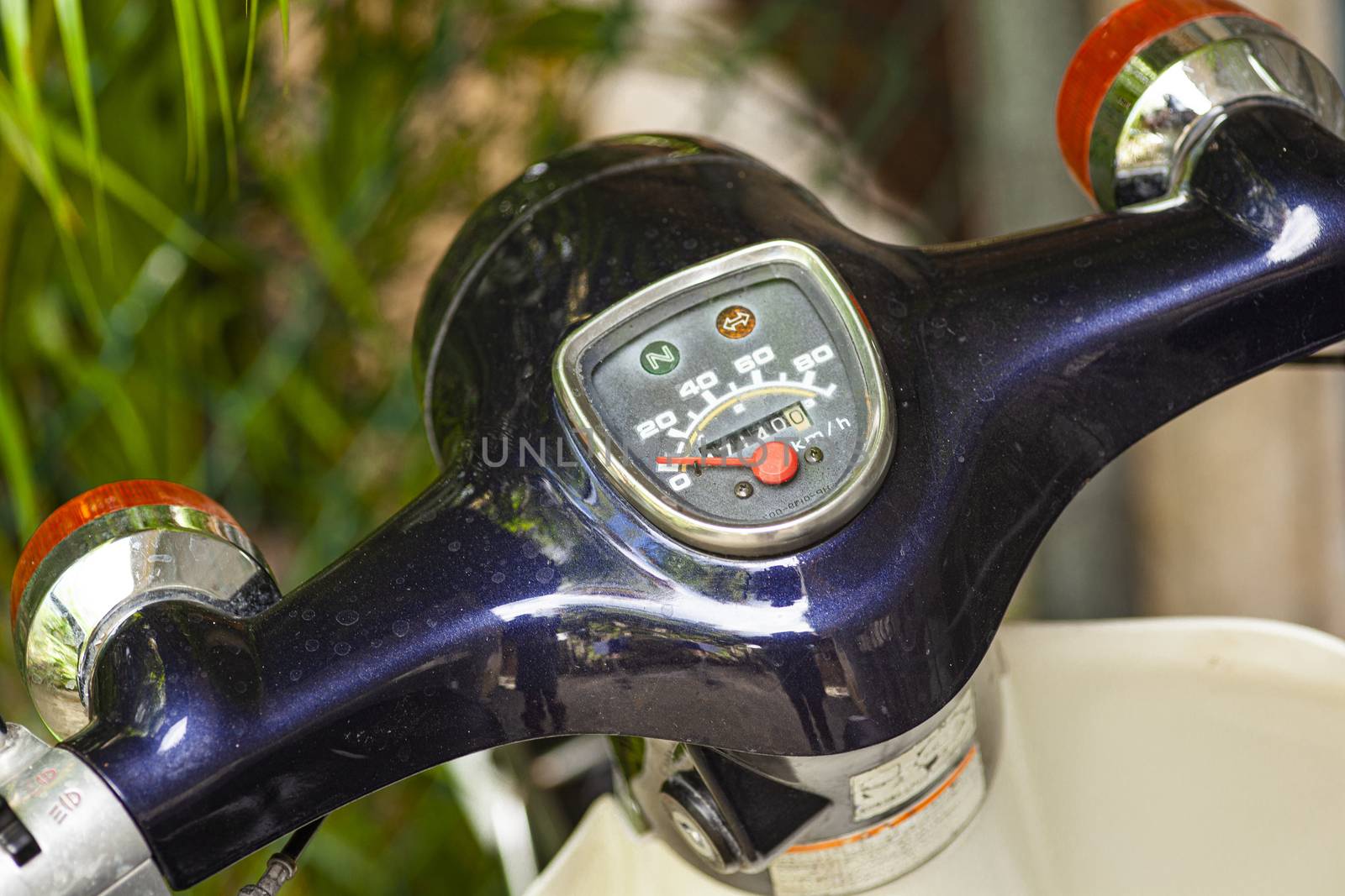 Odometer of a vintage motorcycle in a macro shoot