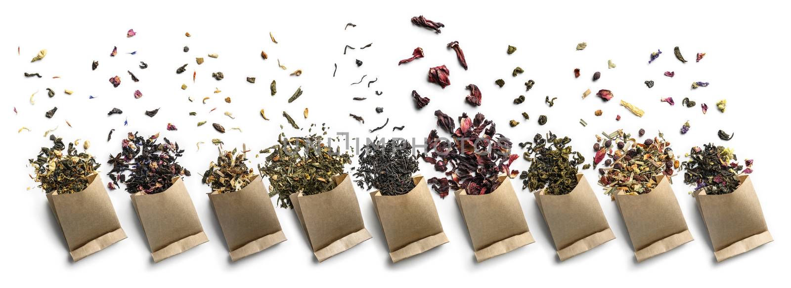 Large assortment of tea on a white background. The view from the top.