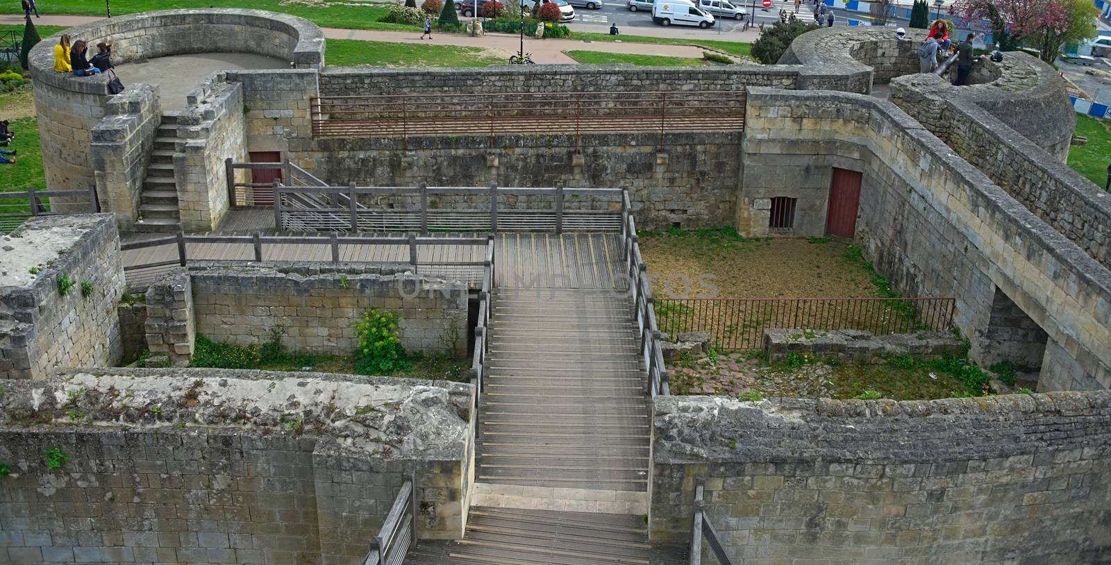 CAEN, FRANCE - April 7th 2019 - Remains of defensive walls and towers at fortress by sheriffkule