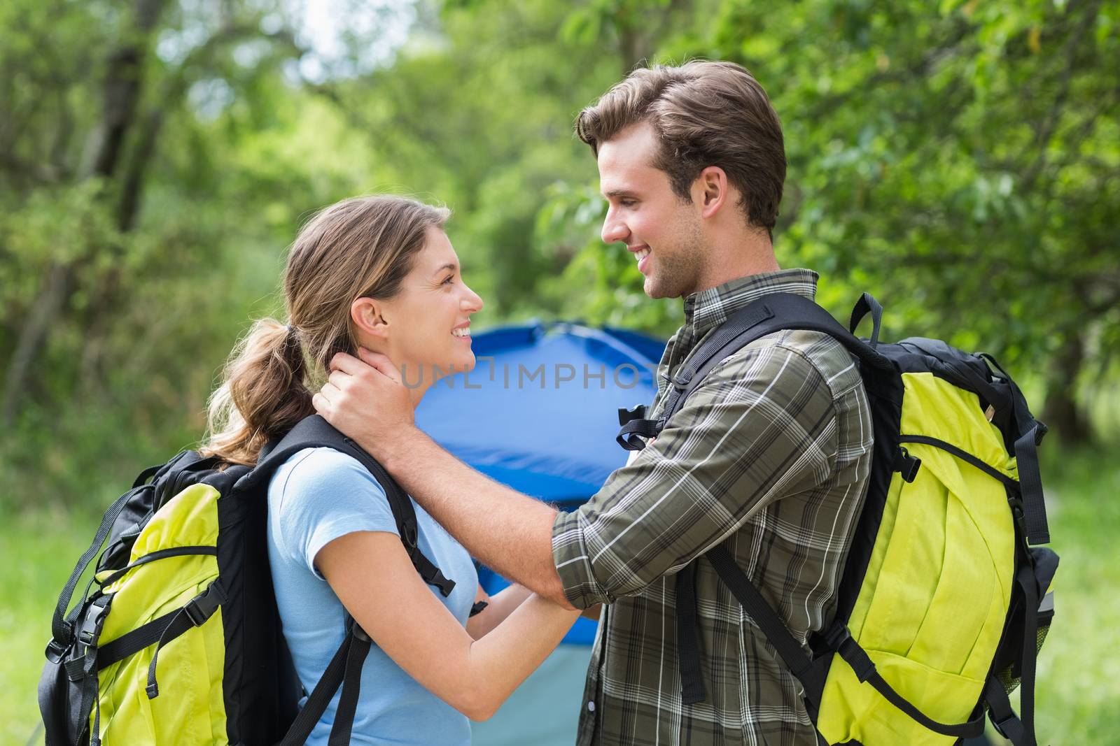 Side view of romantic couple looking at each other at campaing