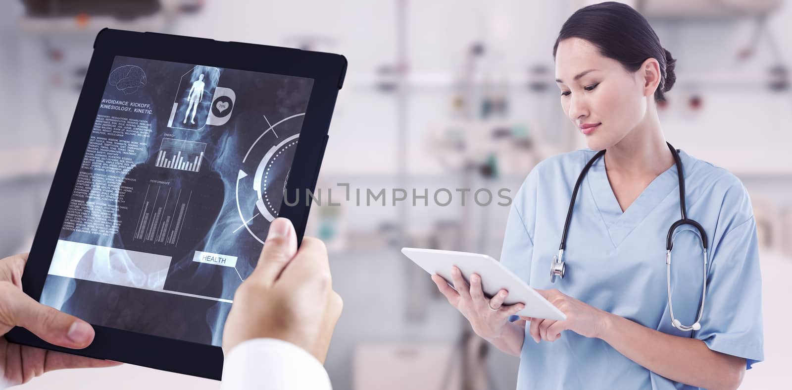 Composite image of surgeon using digital tablet with group around table in hospital by Wavebreakmedia