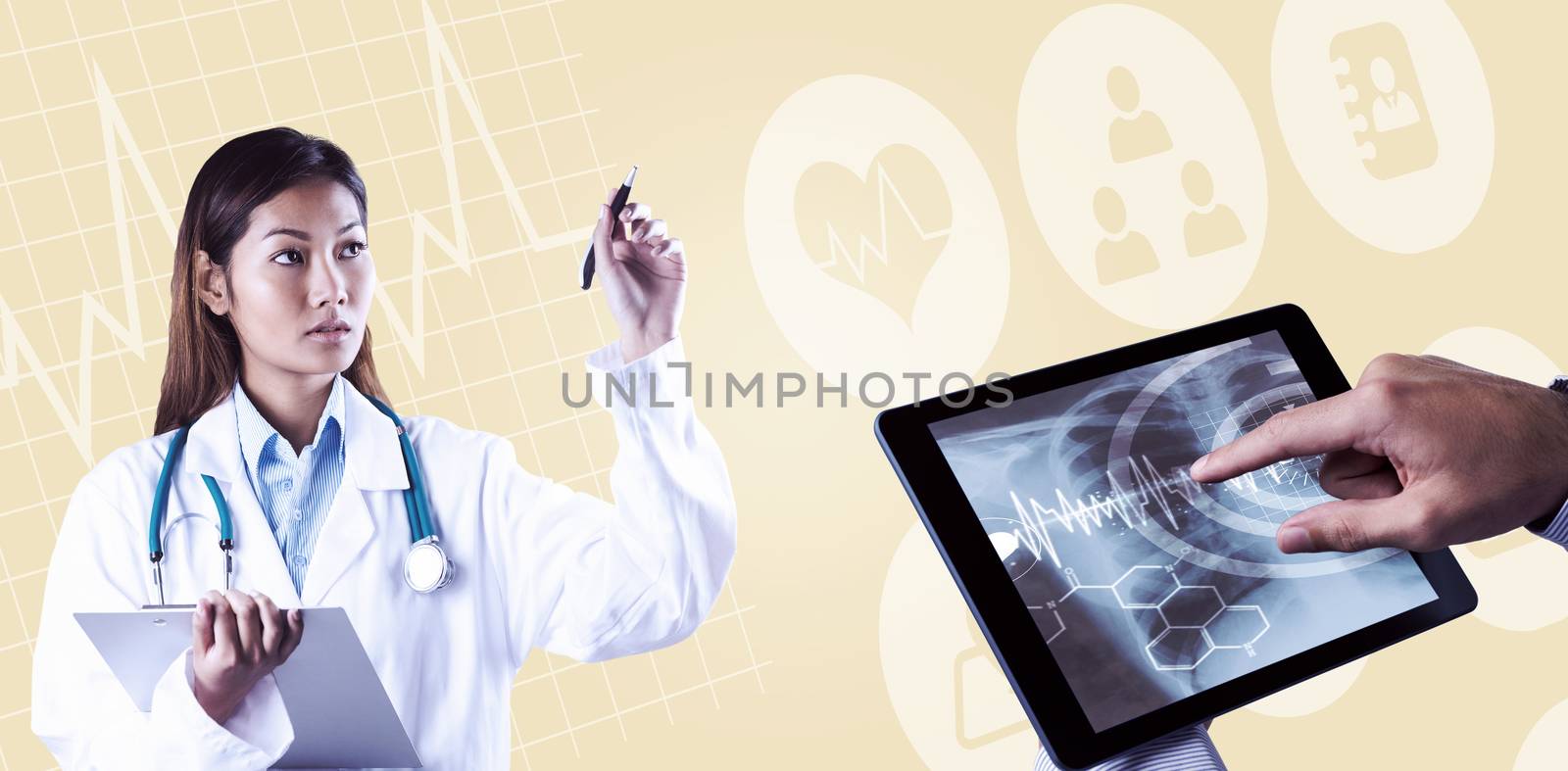 Composite image of asian doctor pointing with pen by Wavebreakmedia