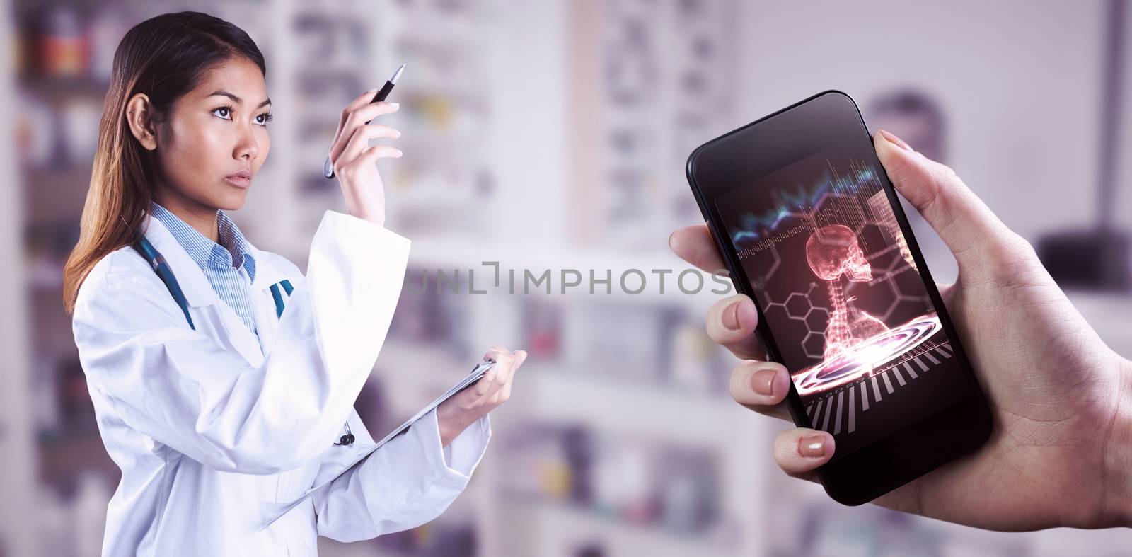 Composite image of asian doctor pointing with pen by Wavebreakmedia