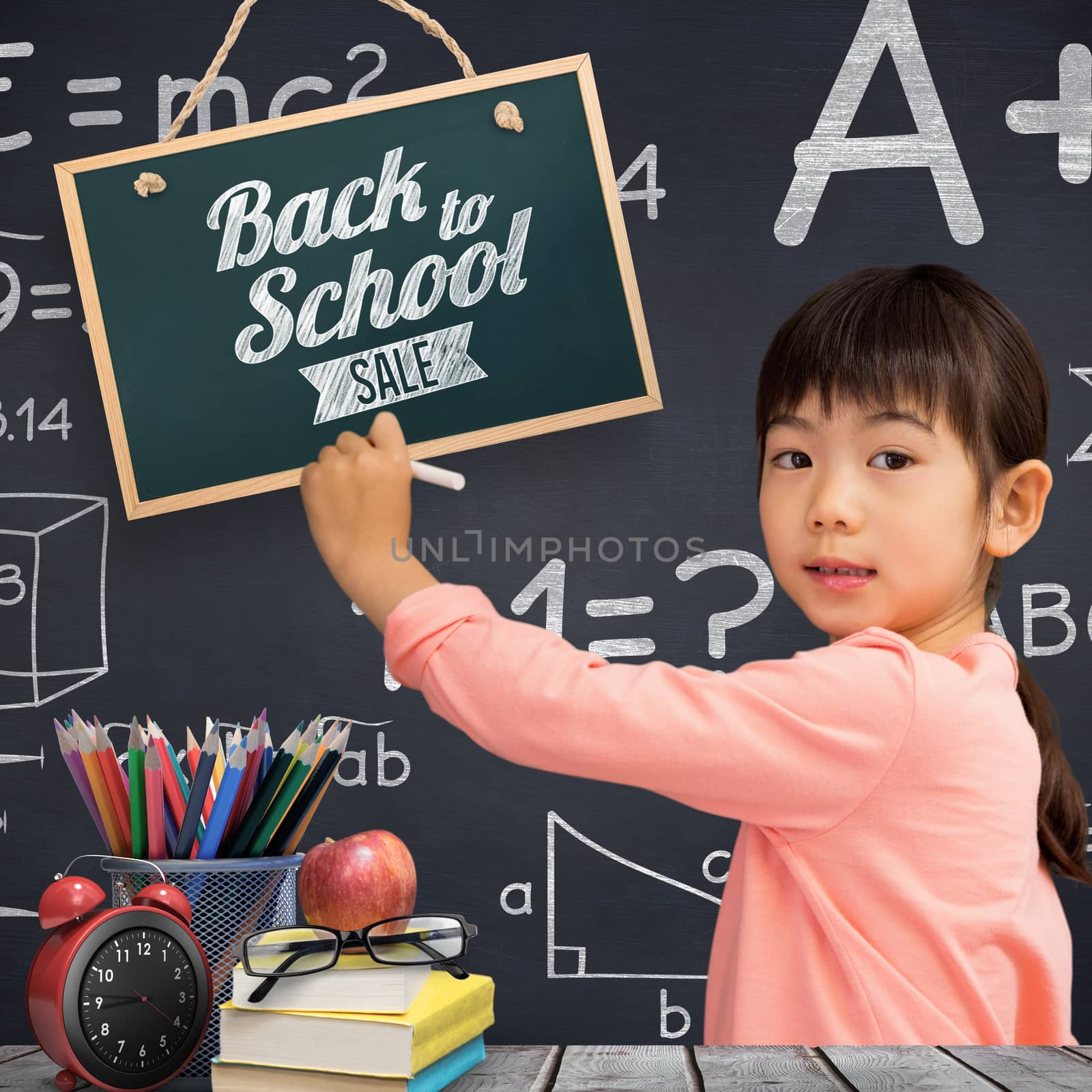 Pupil drawing with chalk against black background