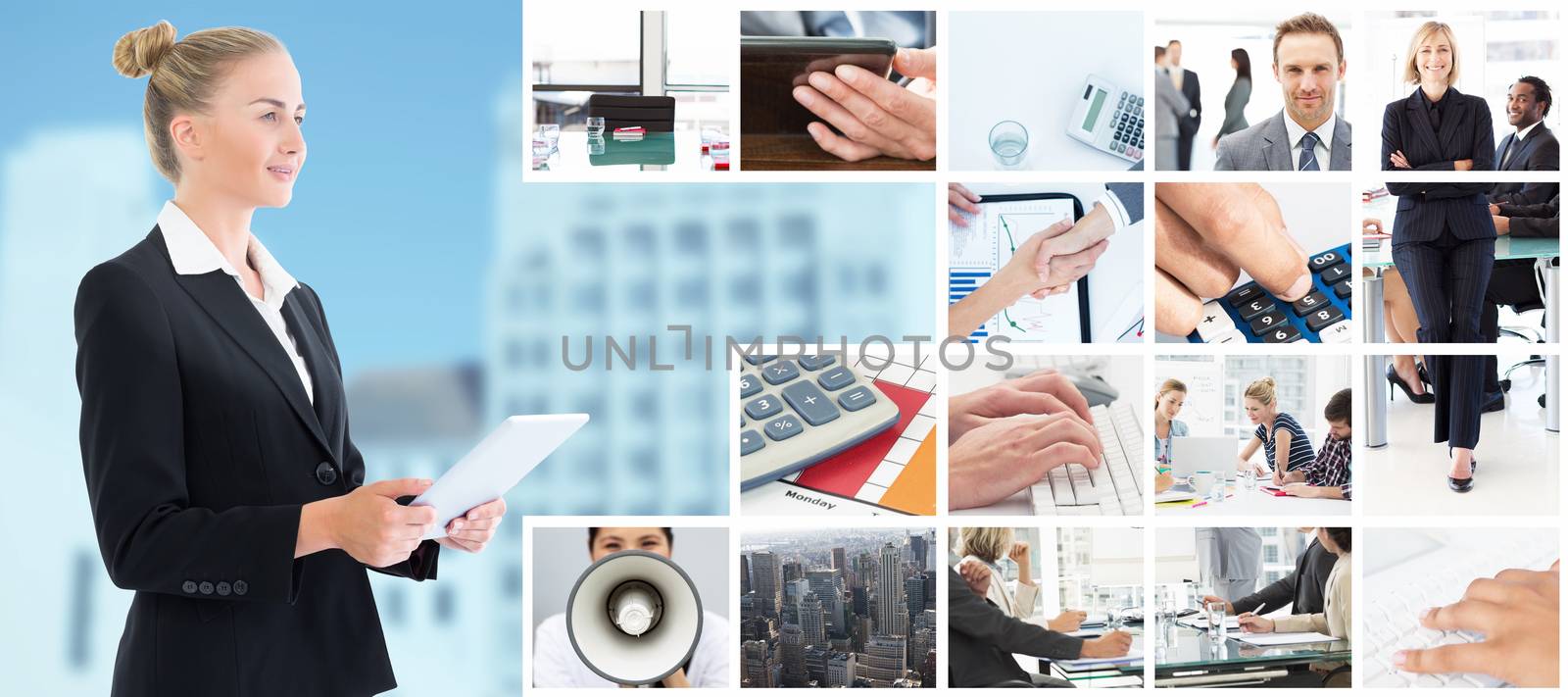 Businesswoman holding tablet against low angle view of city buildings