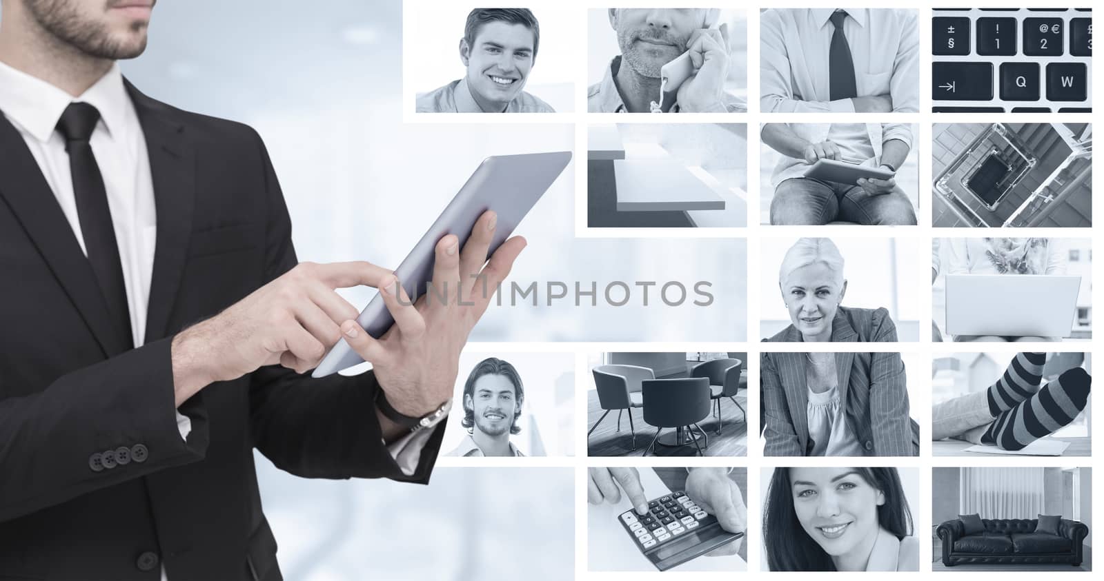 Composite image of mid section of a businessman using digital tablet pc by Wavebreakmedia