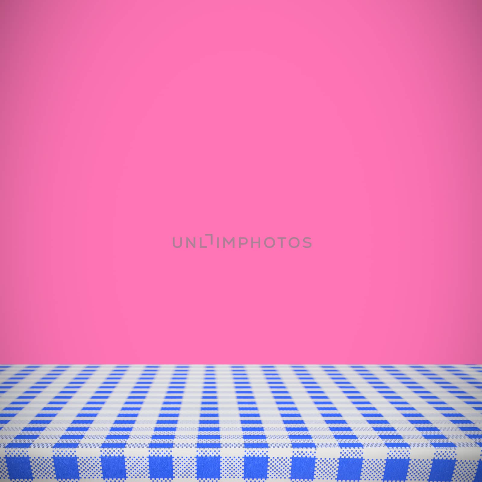 Blue and white tablecloth against pink background