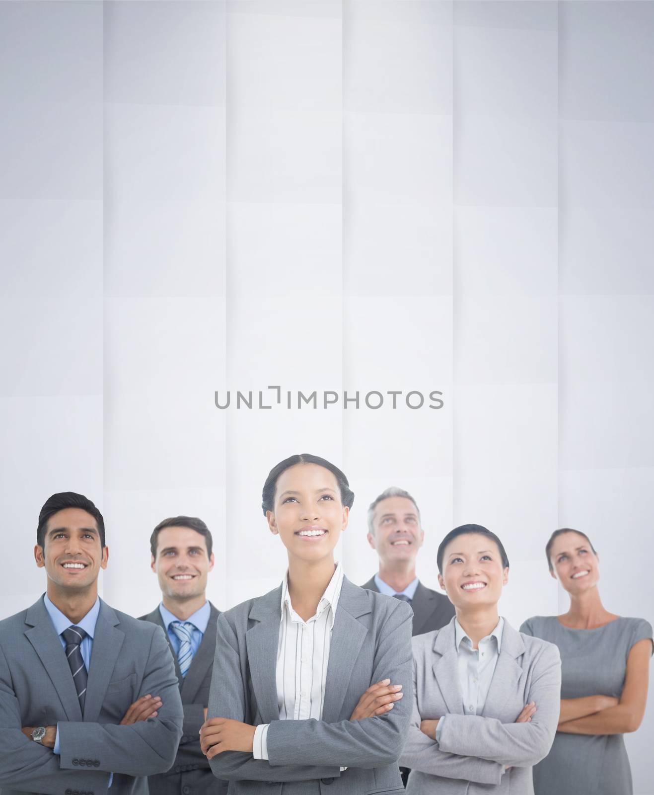 Composite image of business people looking up in office by Wavebreakmedia
