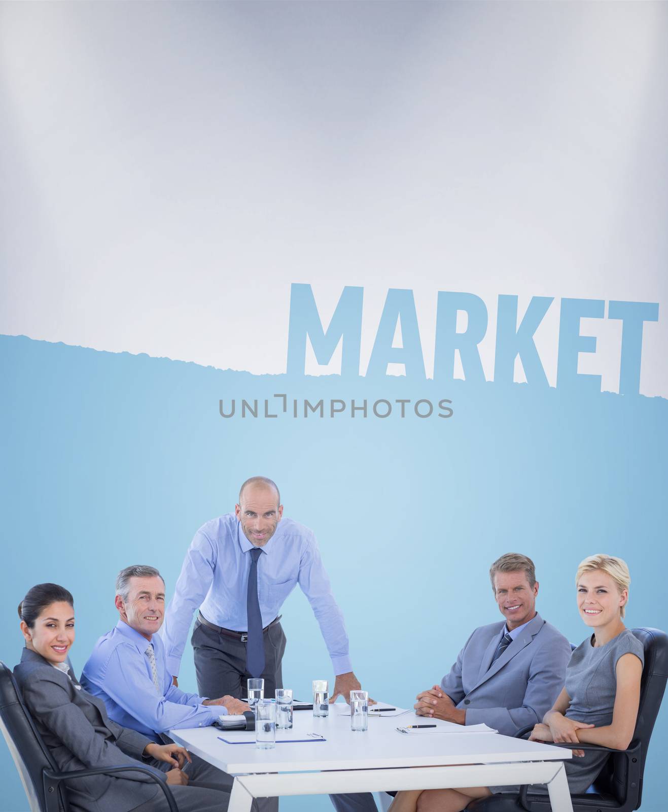 Composite image of happy business people looking at camera by Wavebreakmedia